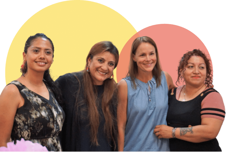 Women standing together smiling